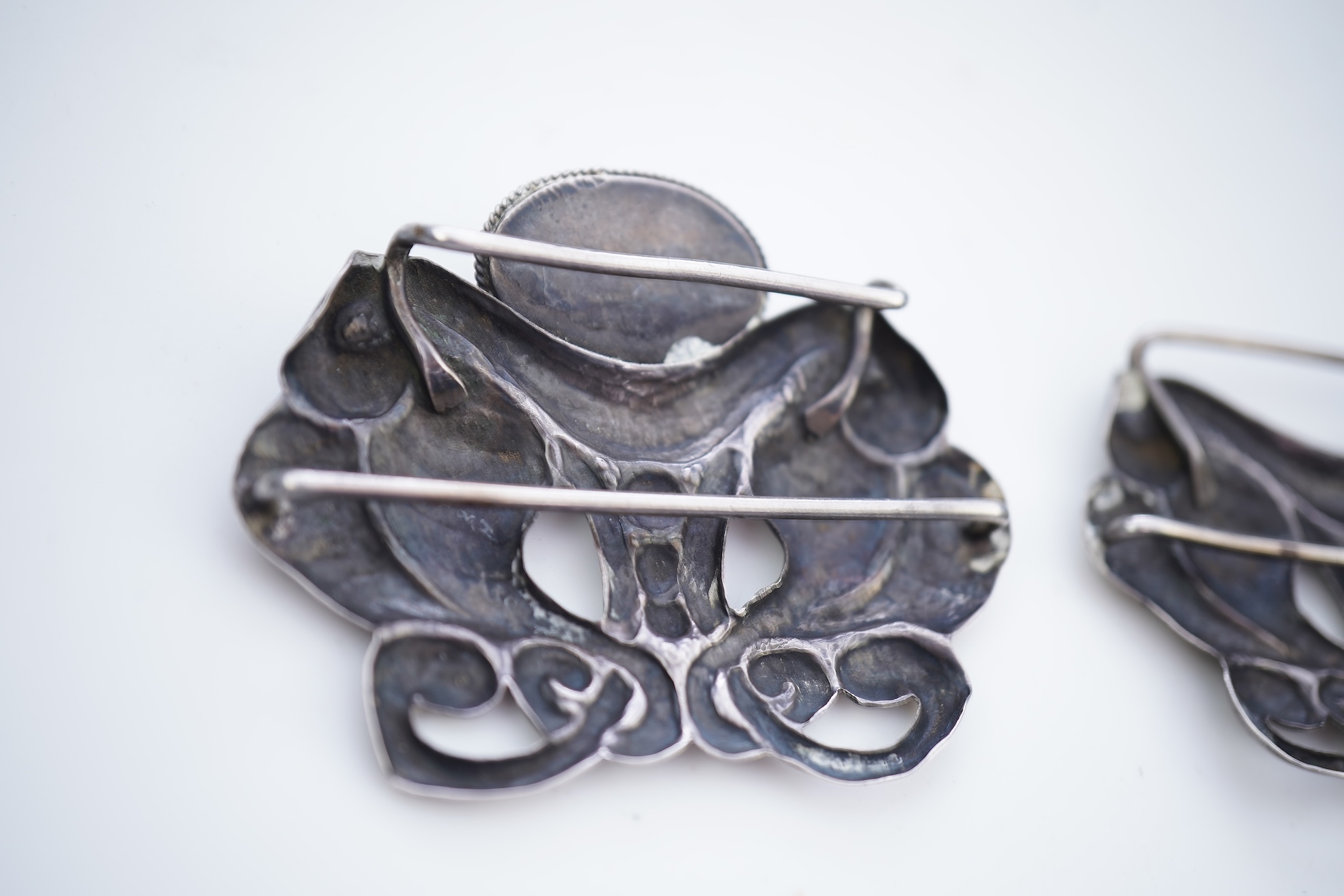 An Arts & Crafts silver and amber buckle, Denmark, early-mid 20th century
